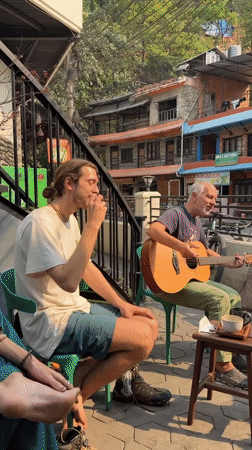 Musicians gather for casual morning session at Pokhara cafe