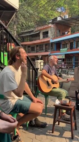 Musicians gather for casual morning session at Pokhara cafe