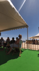 Small gathering observed under canopy in Cannes
