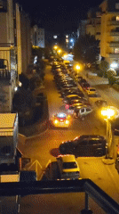 Nighttime street observations and cat moments captured from above