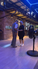 Couples dance at Pattaya restaurant during afternoon hours