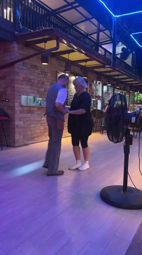 Couples dance at Pattaya restaurant during afternoon hours