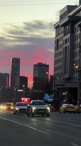 Pink sunset illuminates Moscow streets at dusk