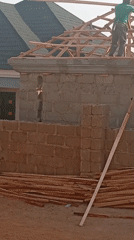 Construction workers build roof in Barakin Akawo, Nigeria