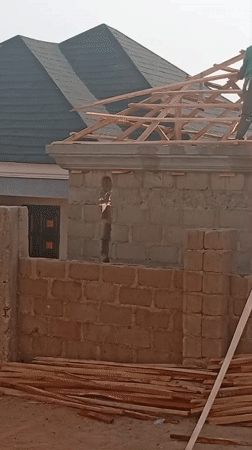 Construction workers build roof in Barakin Akawo, Nigeria