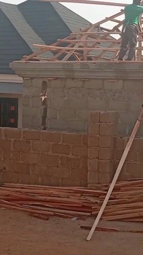 Construction workers build roof in Barakin Akawo, Nigeria
