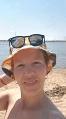 Family beach day documented in Noviy, Russia morning