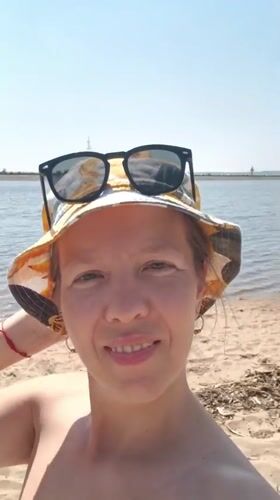 Family beach day documented in Noviy, Russia morning
