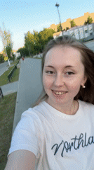 Woman documents urban walk and shrimp meal preparation