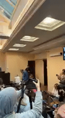Indoor gathering captured on video in Kyiv conference room