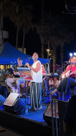 Live music night in Tel Aviv with a crowd gathered outside