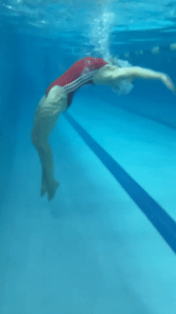 Underwater pool swim session in Markovskiy, Russia