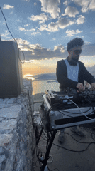 DJ performs sunset set on Montenegro clifftop
