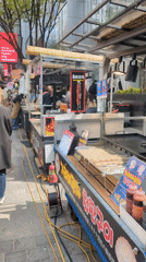 Early morning street food activity observed in Seoul's Myeongdong