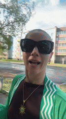 Woman records multiple self-videos near playground in Abakan, Russia