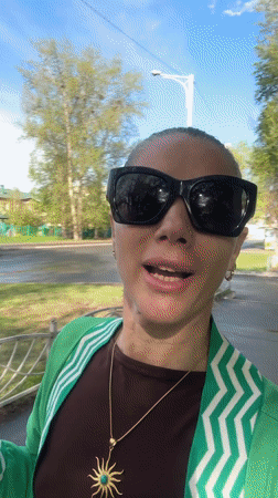 Woman records multiple self-videos near playground in Abakan, Russia