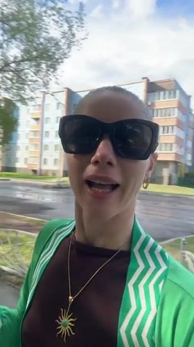 Woman records multiple self-videos near playground in Abakan, Russia