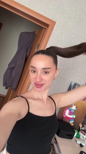 Woman records selfie videos in Rodniki, Russia
