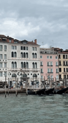 Overcast morning scenes documented across Venice waterways and cafes