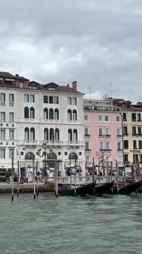 Overcast morning scenes documented across Venice waterways and cafes