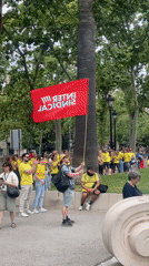 Yellow-shirted crowd gathers for demonstration in Barcelona park