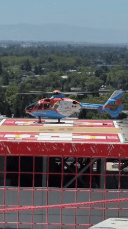 Helicopter parked on a Sacramento rooftop helipad