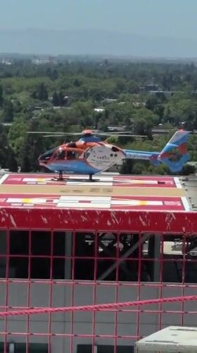 Helicopter parked on a Sacramento rooftop helipad