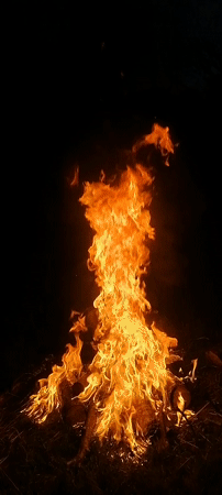 Large campfire burns at night in Tsvkvara