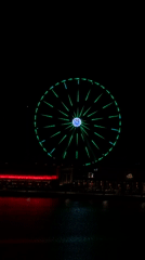 Colorful Ferris wheel light show captivates Lusail waterfront evening