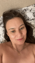 Woman and kitten share quiet domestic moments in Perm