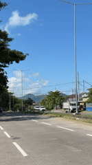 Morning traffic flows on Klungkung road and bridge