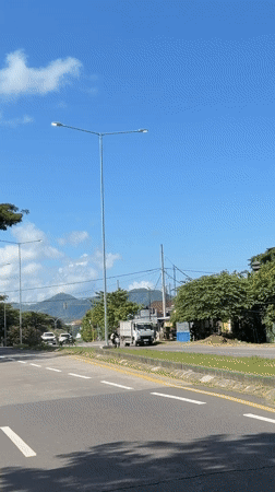 Morning traffic flows on Klungkung road and bridge