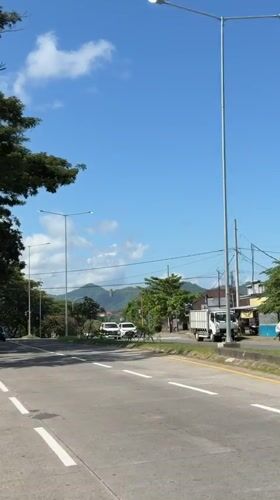 Morning traffic flows on Klungkung road and bridge