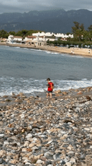 Family enjoys morning beach time in Mont-roig del Camp