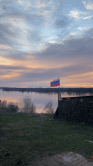 Sunset basketball moment captured near river in Ольховка, Russia