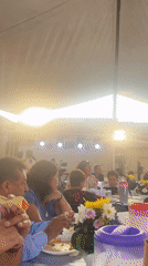 Community gathering held under tent in Puebla, Mexico