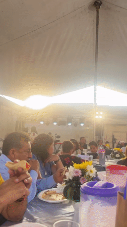 Community gathering held under tent in Puebla, Mexico