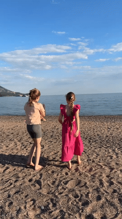 Two girls spotted on beach near Italian restaurant, Montenegro