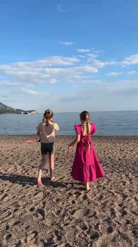Two girls spotted on beach near Italian restaurant, Montenegro