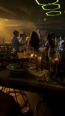 Evening social gathering at Sofia nightclub features dancing, modern lighting