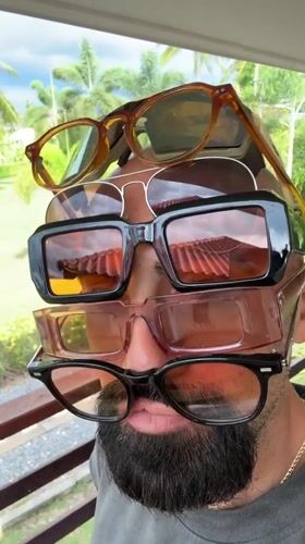 Stacking five pairs of sunglasses in Ko Samui