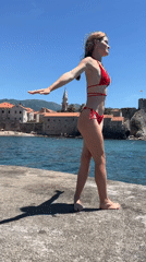 Beach photoshoot on Budva pier overlooking Adriatic Sea