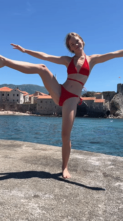 Beach photoshoot on Budva pier overlooking Adriatic Sea