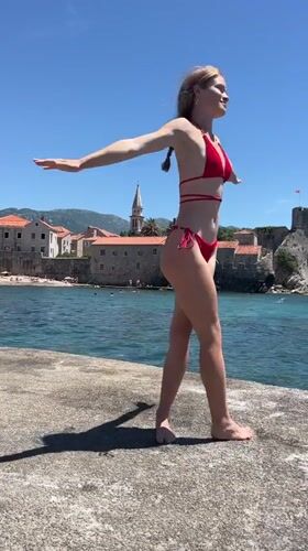 Beach photoshoot on Budva pier overlooking Adriatic Sea