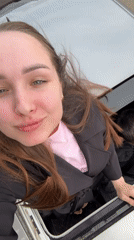 Woman records selfie videos from moving vehicle in Russia