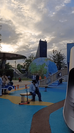 Evening family time at Moscow amusement park playground