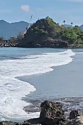 Coastal scene documented at Naga Umbang, Indonesia shoreline