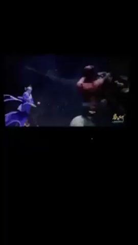 The video shows a brief animated fight sequence. The fight appears to take place between two characters, one smaller and dressed in blue robes, and one larger and muscular with reddish skin and minimal clothing. The larger character is shown falling to the ground, followed by a close-up of a hand with a piece of armor. The background is dark.