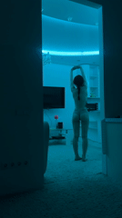 Woman recorded stretching indoors in Khimki, Russia