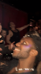 Late night dancing scene captured at London nightclub